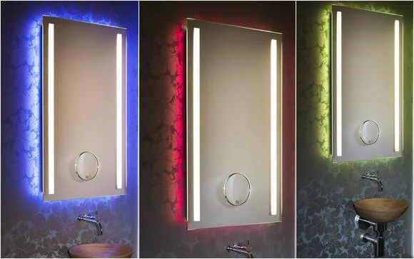 Inmitten der innovativen Einrichtungskonzepte für die gehobene Innenarchitektur sind Lichtspiegel mit farblichem Wechsel das revolutionäre Highlight. In einer einzigartigen Kombination aus technischem Raffinesse, Funktionalität und anspruchsvollem Design definiert Torsten Müller das Thema Lichtdesign-Spiegel neu. Der Schöner Wohnen Profi weiß, Licht und Farbe tragen wesentlich dazu bei, das Raumgefühl angenehm zu beeinflussen. In formaler Reduziertheit fokussiert der farbliche Lichtspiegel den Blick auf sich. Auffällig ist das intelligente indirekte Beleuchtungskonzept, das stets für die individuelle Lebensfreude justierbar und bedienbar ist. Hochwertig und äußerst funktional ist auch die geeignete Bedienbarkeit für jede Generation von IPhone- und IPad-Geräten per IPhone App und durch die Einbindung in die Smart Home Technik somit auch der fortschreitenden Digitalisierung im Badezimmer angepasst. Individualität pur in unterschiedlichen Spiegel-Formaten, Beleuchtungsarten oder mit integriertem Kosmetikspiegel (mit 5- facher Vergrößerung ein perfekter Assistent bei der Rasur oder beim Schminken) sind realisierbar inkl. optimaler Gesichtsausleuchtung. Die LED-Lichtkomposition ist langlebig, der Stromverbrauch minimal. Der Lichtfarbenspiegel by Torsten Müller ist erhältlich in den vielfältigsten Größen und somit passend im Bad, Spa und Raumdesign und natürlich auch im Gäste WC einzusetzen. 