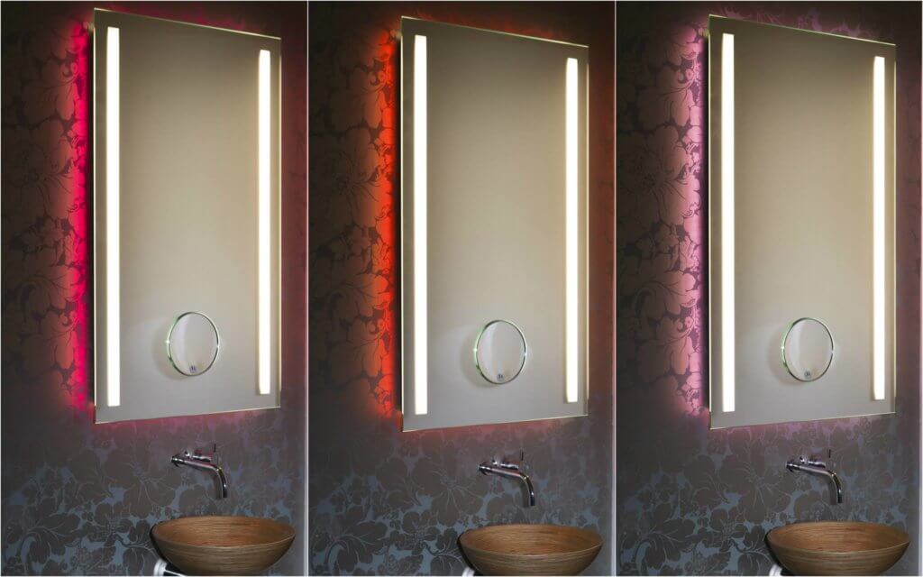 Inmitten der innovativen Einrichtungskonzepte für die gehobene Innenarchitektur sind Lichtspiegel mit farblichem Wechsel das revolutionäre Highlight. In einer einzigartigen Kombination aus technischem Raffinesse, Funktionalität und anspruchsvollem Design definiert Torsten Müller das Thema Lichtdesign-Spiegel neu. Der Schöner Wohnen Profi weiß, Licht und Farbe tragen wesentlich dazu bei, das Raumgefühl angenehm zu beeinflussen. In formaler Reduziertheit fokussiert der farbliche Lichtspiegel den Blick auf sich. Auffällig ist das intelligente indirekte Beleuchtungskonzept, das stets für die individuelle Lebensfreude justierbar und bedienbar ist. Hochwertig und äußerst funktional ist auch die geeignete Bedienbarkeit für jede Generation von IPhone- und IPad-Geräten per IPhone App und durch die Einbindung in die Smart Home Technik somit auch der fortschreitenden Digitalisierung im Badezimmer angepasst. Individualität pur in unterschiedlichen Spiegel-Formaten, Beleuchtungsarten oder mit integriertem Kosmetikspiegel (mit 5- facher Vergrößerung ein perfekter Assistent bei der Rasur oder beim Schminken) sind realisierbar inkl. optimaler Gesichtsausleuchtung. Die LED-Lichtkomposition ist langlebig, der Stromverbrauch minimal. Der Lichtfarbenspiegel by Torsten Müller ist erhältlich in den vielfältigsten Größen und somit passend im Bad, Spa und Raumdesign und natürlich auch im Gäste WC einzusetzen.