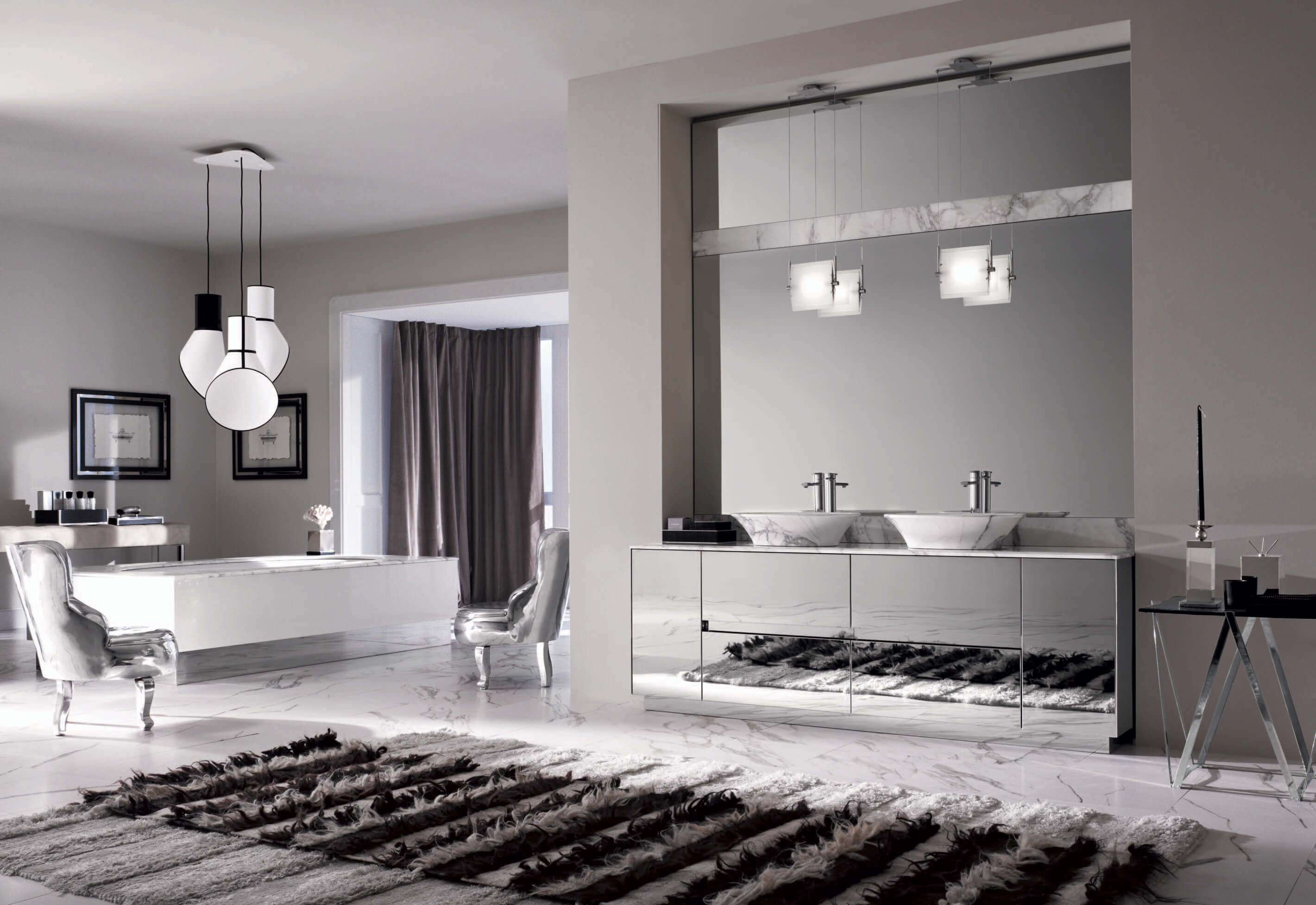 Puro by Noorth Mit einem minimalistischen und edlem Design, rasiermesserscharfen Kanten und kostbaren Oberflächen der Waschtischunterschränke begeistert das Modulsystem für das Badezimmer auf den ersten Blick. Sofort ins Auge sticht die Reduktion auf das Wesentliche: Anstatt von Türgriffen findet man versteckte Handgriffe vor, die je nach gewünschter Höhe seitlich angebracht werden. Gemeinsam mit indirekten LED-Leuchten wird dadurch der Fokus auf die pure Formenschönheit gelenkt. Herausragende Materialien, wie handverlesene Hölzer, Marmor, Granit und Keramik reduzieren das Mobiliar auf das Wesentliche und helfen dabei, über das Sein nachzudenken und sich während eines entspannten Bades in der geometrisch genauen Wanne zurückzulehnen und sich auf die wichtigen Dinge des Lebens zu besinnen.